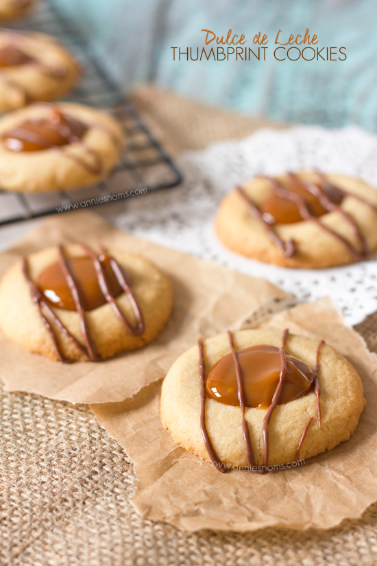 These thumbprint cookies marry crisp, buttery cookie dough, sweet, rich dulce de leche and melted chocolate to create tiny little bites of heaven!
