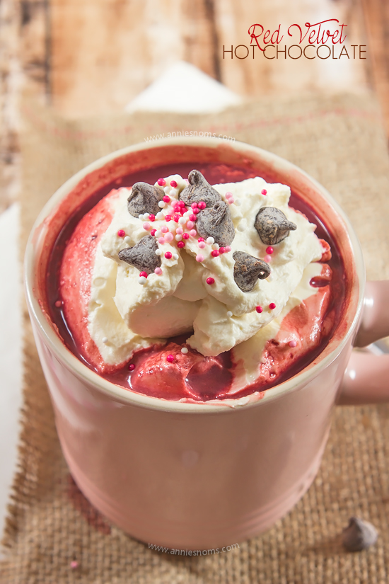 This velvety smooth Red Velvet Hot Chocolate is topped with sweetened whipped cream and chocolate to make a satisfying, rich beverage for this Valentine's Day!