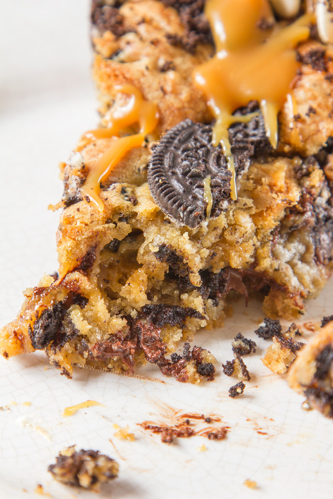 Oreo and chocolate chip stuffed cookie dough with an oozing middle of salted caramel sauce and a topping of more cookie dough and Oreo's. Bake it up and you will have a gooey, golden, rich, sweet and salty dessert which tastes like pure heaven.