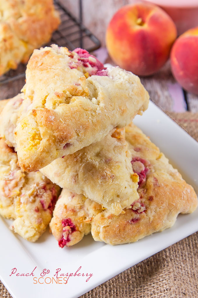 What is better than a fresh, homemade scone for breakfast? A homemade Peach and Raspberry Scone! Light, flaky, buttery and filled with fruit, these are the perfect start to your day!