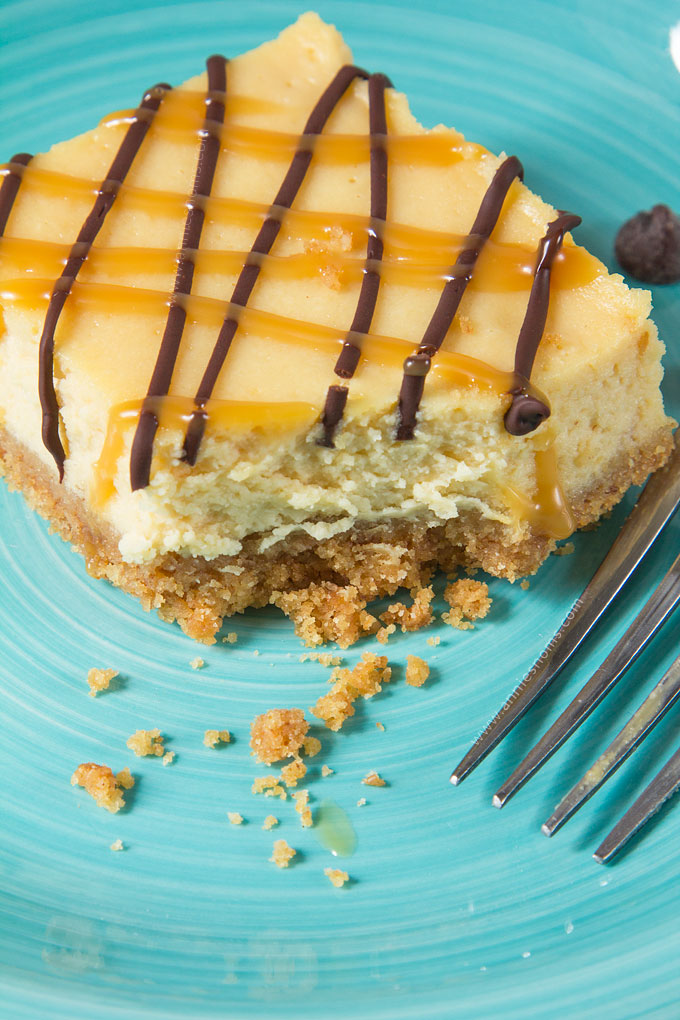 My Salted Caramel Cheesecake Bars marry velvety smooth cheesecake with the salty sweet gorgeousness that is Salted Caramel. With caramel in the cheesecake and on top, these are a caramel lovers dream!