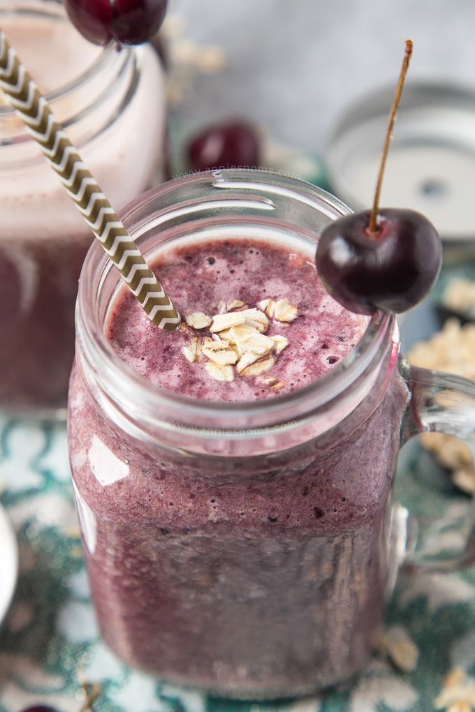 A thick, sweet and hearty Oat Smoothie with Cherries, bananas and oats. Filling and delicious, this smoothie is perfect for breakfast, lunch or an afternoon pick me up!