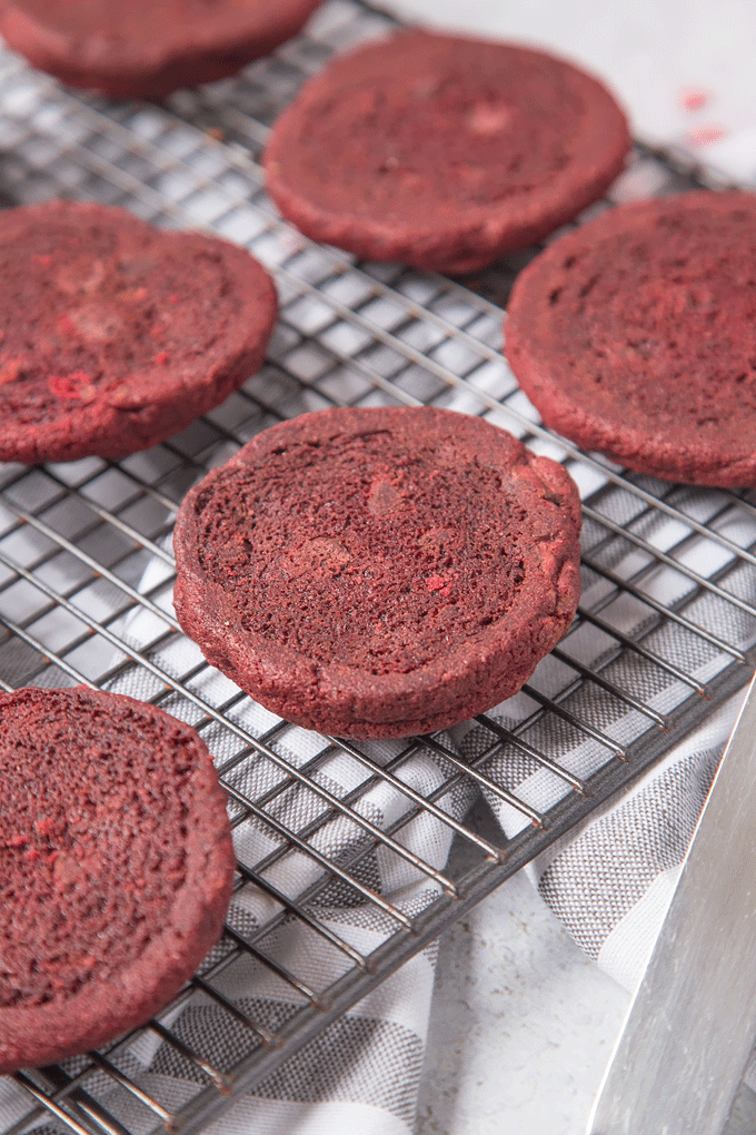 Soft, chewy Chocolate Chip filled Red Velvet Cookies sandwiched together with creamy, smooth chocolate spread to make a cute and delicious Valentine's treat!