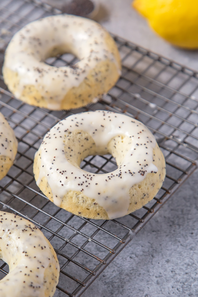 These baked Lemon Poppy Seed Doughnuts are light, crunchy and filled with lemony goodness! An easy, super tasty Spring bake everyone will love!