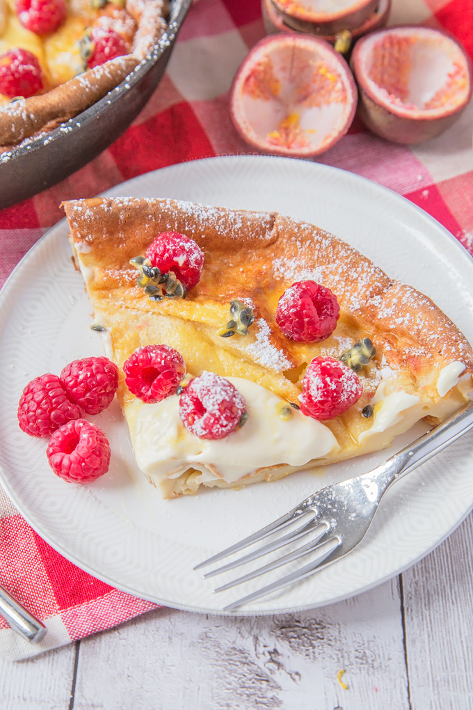 My easy and scrumptious Raspberry and Passion Fruit Dutch Baby is the perfect family breakfast recipe to make this Spring!