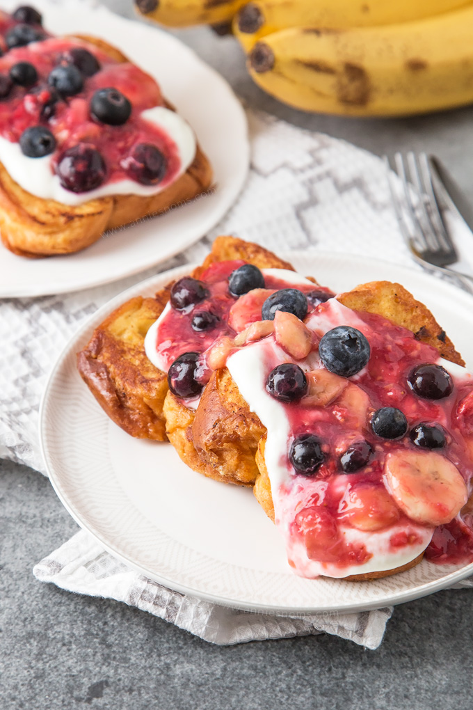 Golden French Toast is topped with a beautiful Banana Berry mixture that takes this breakfast to another level.