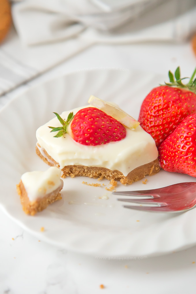 These creamy Lemon and Ginger Cheesecake Bars are easy to make and pack a real flavour punch with their gingersnap crust and zest filled cheesecake top!