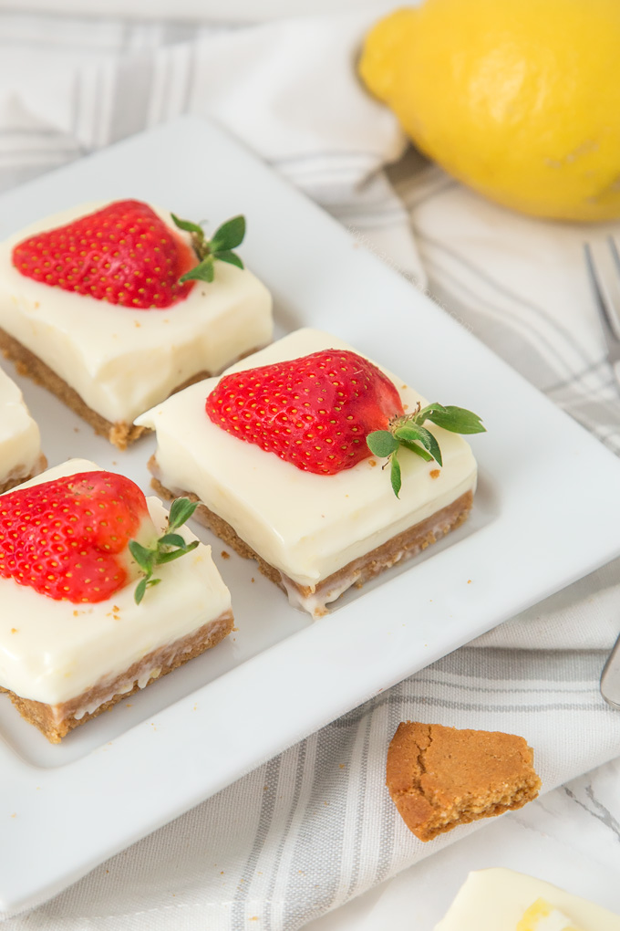 These creamy Lemon and Ginger Cheesecake Bars are easy to make and pack a real flavour punch with their gingersnap crust and zest filled cheesecake top!