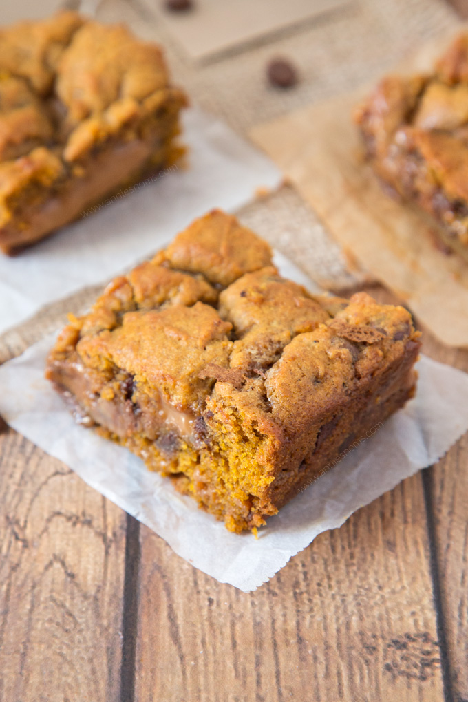 These Pumpkin Caramel Cookie Bars are sinfully good! Chewy Pumpkin cookie dough layered with thick caramel and cut into squares; you’ll not be able to say no to them!