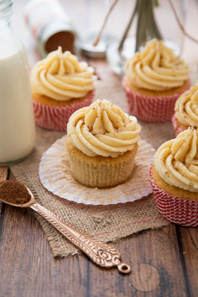 Light and fluffy Eggnog laced cupcakes with a creamy, smooth Eggnog frosting make these the perfect Holiday cupcake!