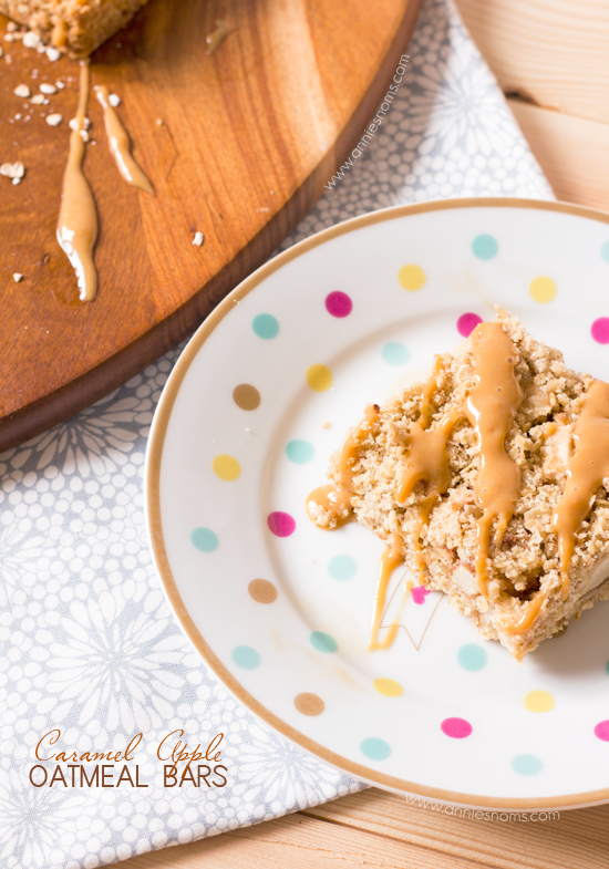 Caramel Apple Oatmeal Bars | Annie's Noms - These Caramel Apple bars are so easy to make, yet beautifully satisfying! A crumble oat mixture is layered with spiced apples before being baked and drizzled with caramel sauce. All of our favourite Fall flavours in one bar.