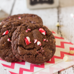 These Candy Cane Fudge Cookies have melted chocolate in the batter to make them super fudgy along with chunks of oozing white chocolate and the refreshing mint flavour of crushed candy canes.