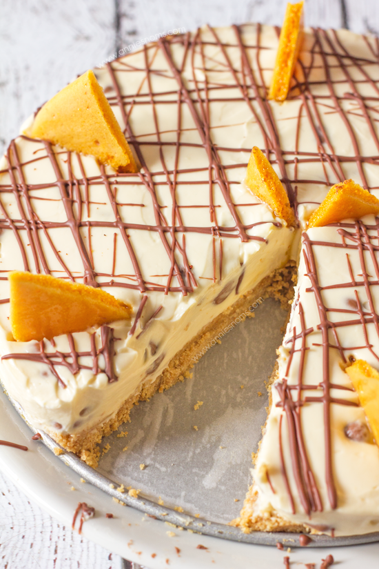 This no-bake Chocolate Honeycomb Cheesecake is packed with tiny morsels of crunchy honeycomb inside a velvety smooth cheesecake. With a simple biscuit base and homemade honeycomb garnish, this dessert is a showstopper that doesn't take hours to make!