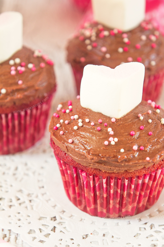 These Pink Velvet Cupcakes are not quite chocolate and not quite vanilla, but they are absolutely delicious! Soft, tender and topped with a rich, melted chocolate frosting; these are the perfect, simple dessert to make for your Valentine!