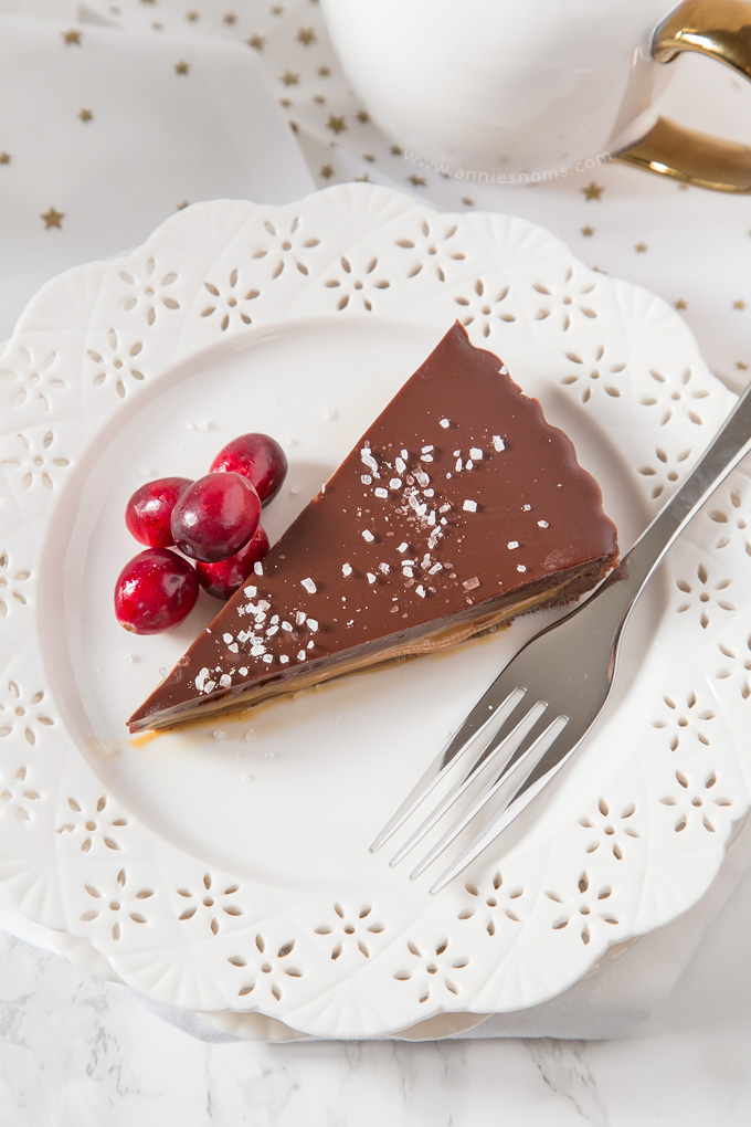 This no-bake Salted Caramel Chocolate Tart is rich, decadent and ridiculously easy to make! The sweet caramel cuts through the chocolate creating one heavenly dessert!