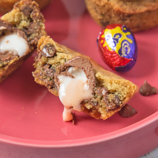 Soft and chewy chocolate chip cookies stuffed with a mini Cadbury Creme Egg. The perfect, easy Easter bake!