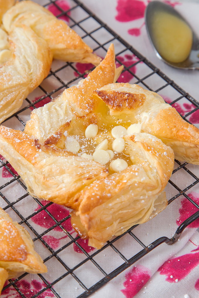 These gorgeous Lemon Curd and White Chocolate Pinwheel Pastries are ready in under 30 minutes and only require 4 ingredients!