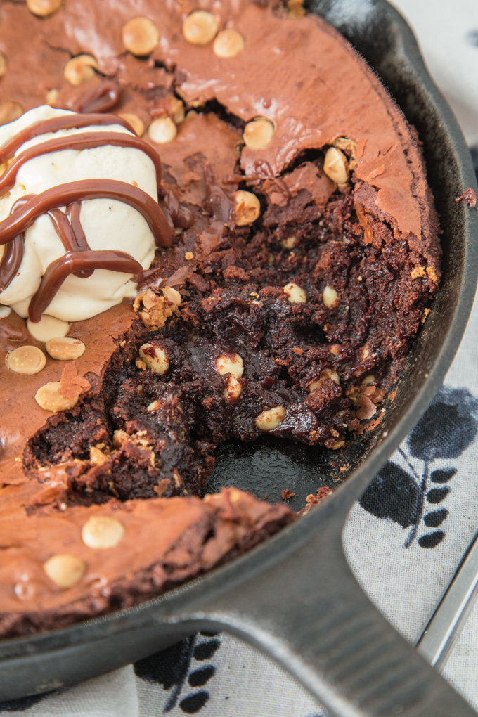 This chewy and decadent Double Chocolate Skillet Brownie is the stuff dreams are made of! Gooey, fudgy and packed with chocolate, it's heaven in every bite!