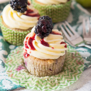 Soft, blackberry filled cupcakes with lime butter cream frosting and blackberry coulis. An explosion of flavour in every bite!