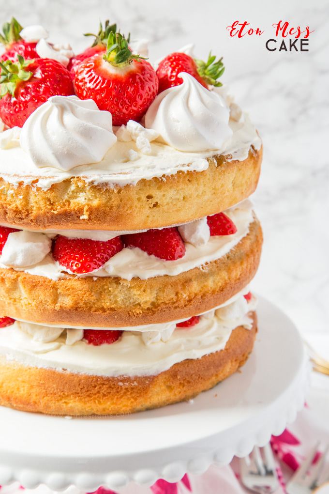 Layers of cake, cream, strawberries and meringue are married together to create this over the top, simply delicious Eton Mess Cake! #ad