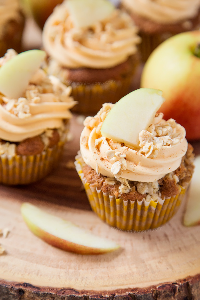 My Apple Crumble Cupcakes are soft, apple filled and topped with deliciously smooth custard frosting and crunchy crumbles. The perfect way to enjoy a classic British dessert!