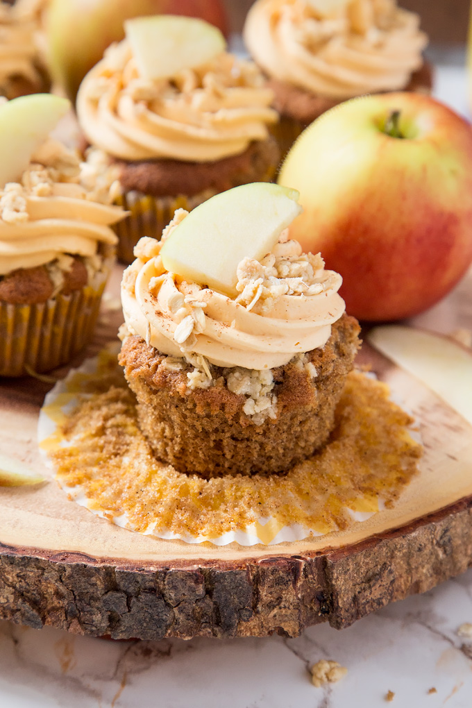 My Apple Crumble Cupcakes are soft, apple filled and topped with deliciously smooth custard frosting and crunchy crumbles. The perfect way to enjoy a classic British dessert!