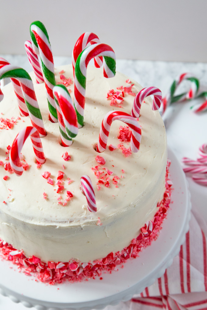 Layers of cake, peppermint buttercream and candy canes make this the ultimate Christmas dessert for any Candy Cane lover! #ad