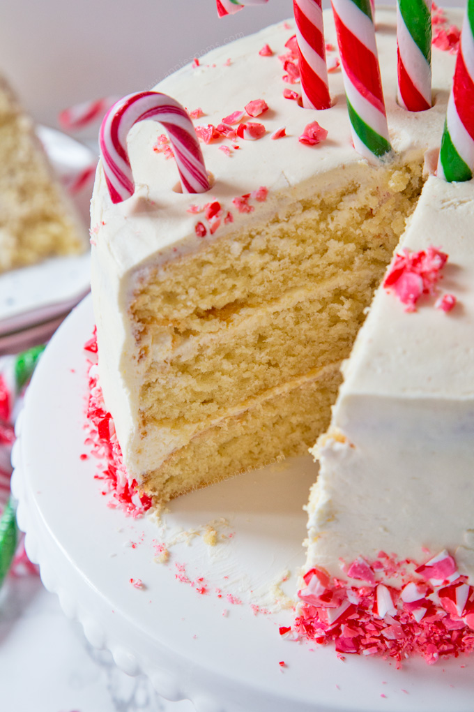 Layers of cake, peppermint buttercream and candy canes make this the ultimate Christmas dessert for any Candy Cane lover! #ad