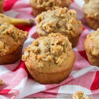 Super soft banana filled muffins with a crunchy streusel topping; these are one seriously delicious way to kick start your day!