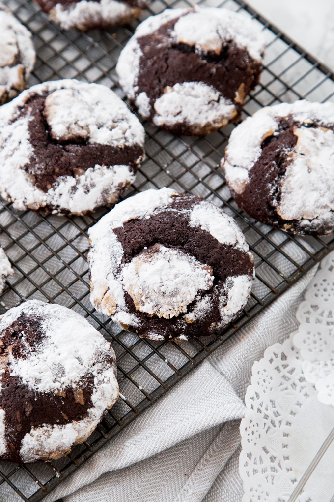 These thick and chewy Chocolate Crinkle Cookies are rolled in tons of powdered sugar and baked until crisp. They're way too good to share!