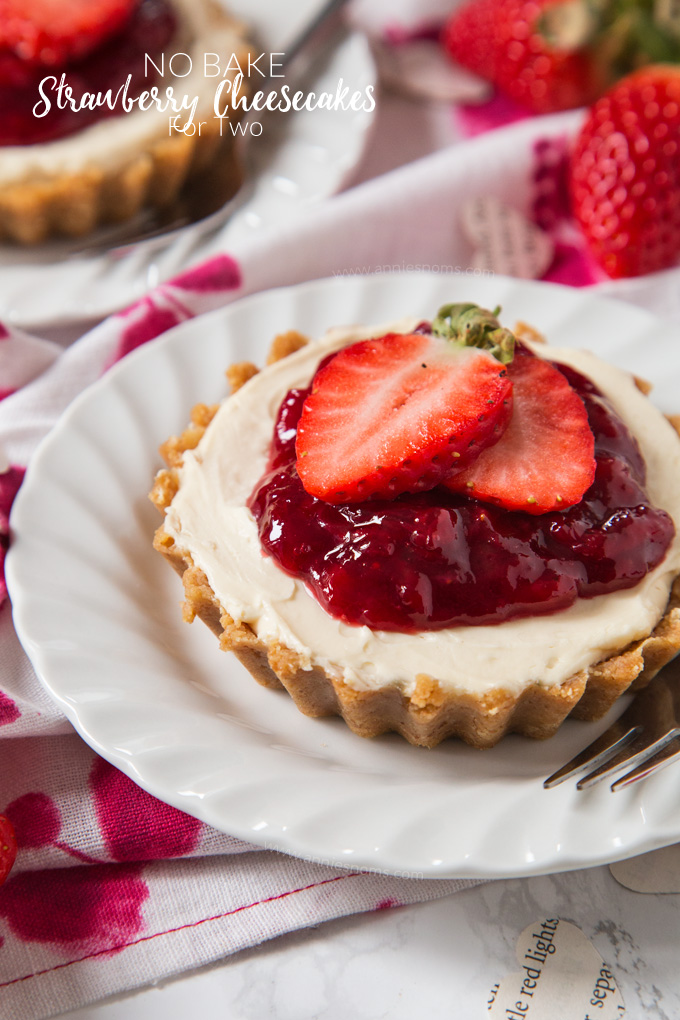 Delightfully creamy and sweet no bake Strawberry Cheesecakes individually portioned and perfect for a Valentine's Day dessert!