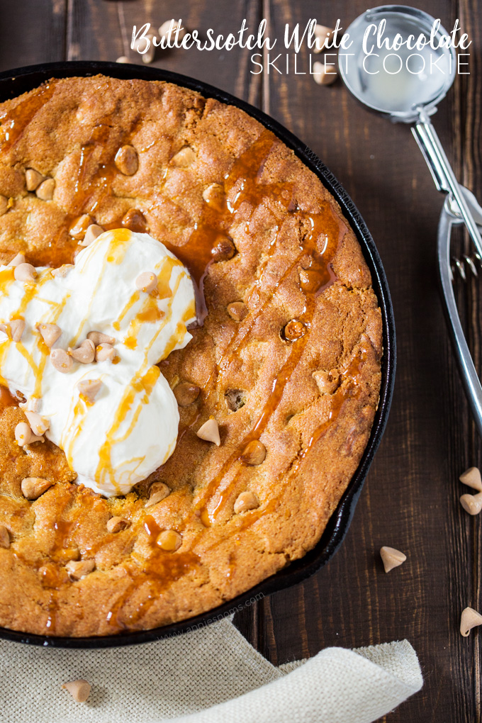 Soft and chewy cookie dough filled with butterscotch and white chocolate chips. Baked until golden and served with ice cream, this skillet cookie is almost too good to share!