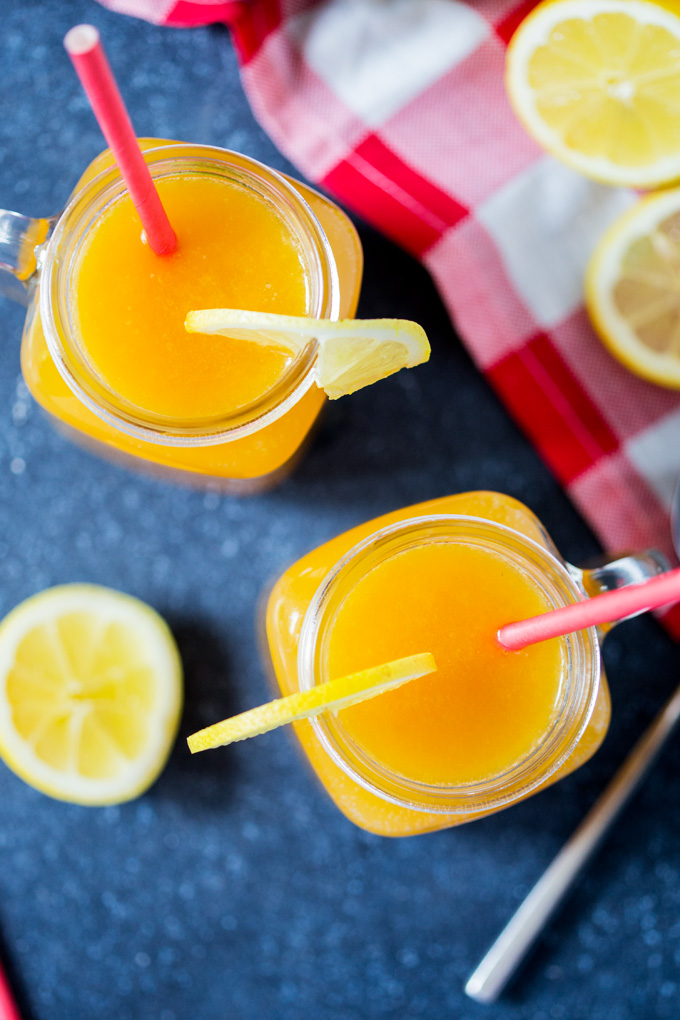 This refreshing Mango Lemonade is the perfect tropical beverage to help you cool down on a hot Summer's day. Sweet and tart, it's also super easy to make!