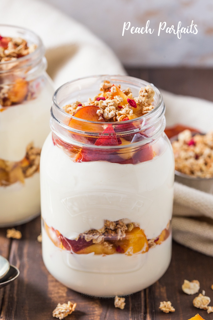 These Peach Parfaits are made with creamy Greek yoghurt, sweet peaches and crunchy granola; light and tasty, you decide whether these are breakfast or dessert!