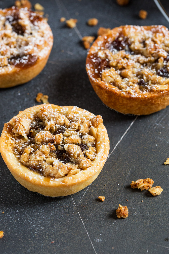 A new twist on the classic Mince Pies, these festive pies have a crunchy, oat topping to contrast with the juicy, sweet filling and crisp homemade pastry outer shell.