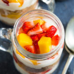 These no bake Strawberry and Mango Cheesecake Jars are the perfect individual sized dessert to make ahead and take to family gatherings!