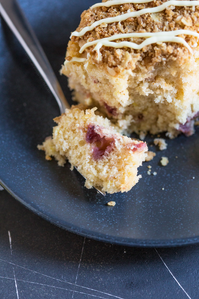 This Strawberry and Lemon Coffee Cake is soft, zingy and filled with juicy strawberries. With its crunchy crumb topping, this is one seriously delicious accompaniment to your coffee!