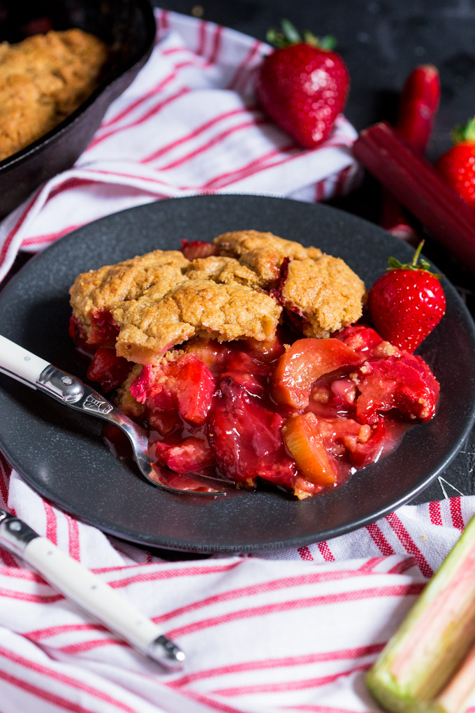 Sweet strawberries and tart rhubarb are married together with a crisp, yet fluffy top to make this sublime cobbler which you'll make again and again!