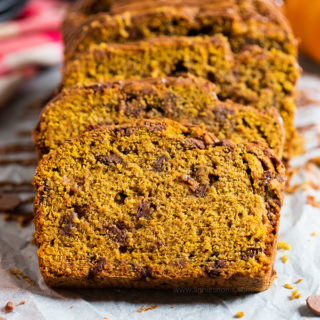 This easy to make Pumpkin Chocolate Chip Bread is spicy, sweet and filled with gooey chocolate chips. Perfect for coffee breaks, breakfast or dessert, you'll make this bread again and again!