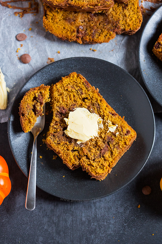 This easy to make Pumpkin Chocolate Chip Bread is spicy, sweet and filled with gooey chocolate chips. Perfect for coffee breaks, breakfast or dessert, you'll make this bread again and again!