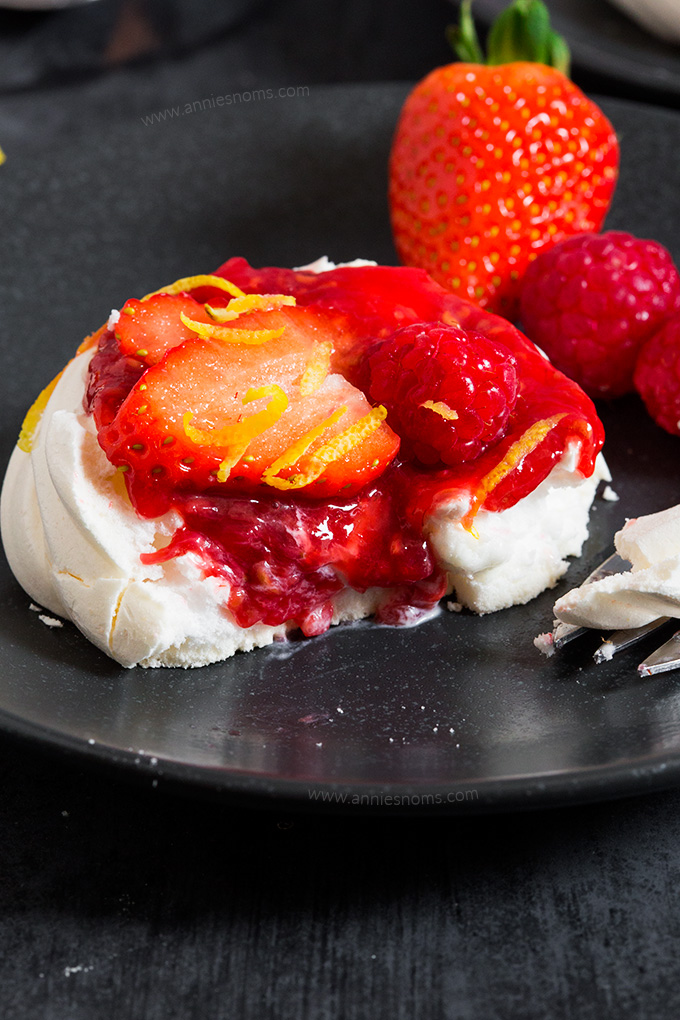 These Meringue Nests with Homemade Berry Jam marry together crunchy, sweet meringue, whipped cream, homemade jam and fresh fruit to make a delicious dessert!