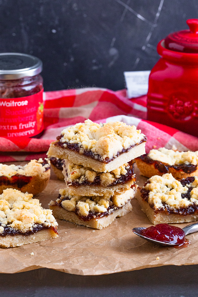 These Strawberry Jam Crumble Bars are buttery, crisp, sweet and full of oozing jam. You don't need any fancy ingredients or equipment to make these and they're easy to throw together!