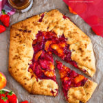 This Strawberry Peach Galette is super easy to make and tastes delicious. Full of sweet, juicy fruit and encased in buttery pastry, it's the easiest type of pie you can make!