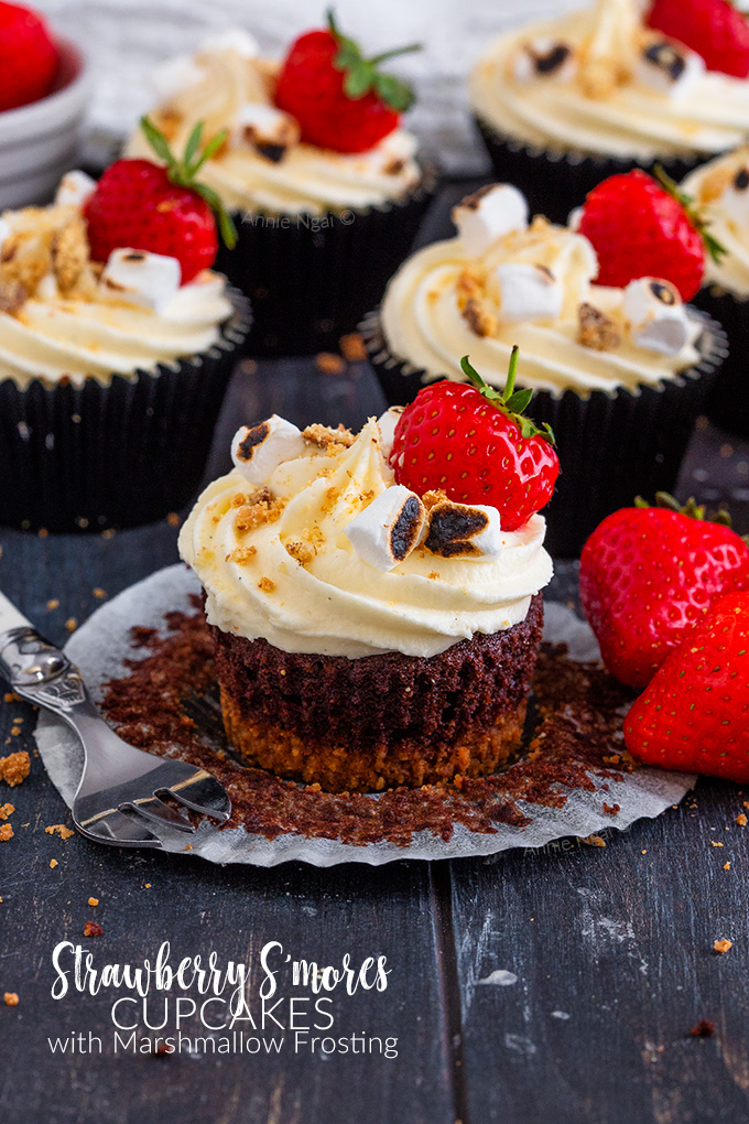 These Strawberry S'mores Cupcakes marry together a biscuit base, rich chocolate cupcake a homemade compote filling and marshmallow frosting to create an indulgent, delicious treat!