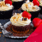 These Strawberry S'mores Cupcakes marry together a biscuit base, rich chocolate cupcake a homemade compote filling and marshmallow frosting to create an indulgent, delicious treat!