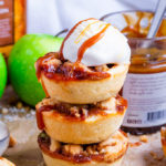 These Mini Toffee Apple Crumble Pies make pie making easy! Made in a muffin tin with buttery pastry, tender apples, toffee sauce and a buttery crumble topping. They are Autumn in dessert form!