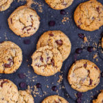 These soft and chewy Vegan Chocolate Chip Cookies are ready in under 30 mins and peppered with oozing vegan chocolate chips. Easy to make and utterly divine, these are bound to become family favourites!