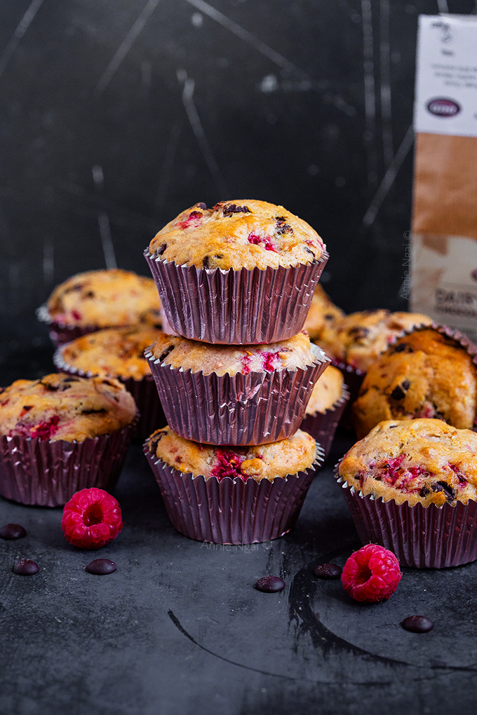 These light and fluffy Raspberry Dark Chocolate muffins are delicious and vegan! Jam packed with dark chocolate and fresh raspberries, they're easy to make and great on the go!