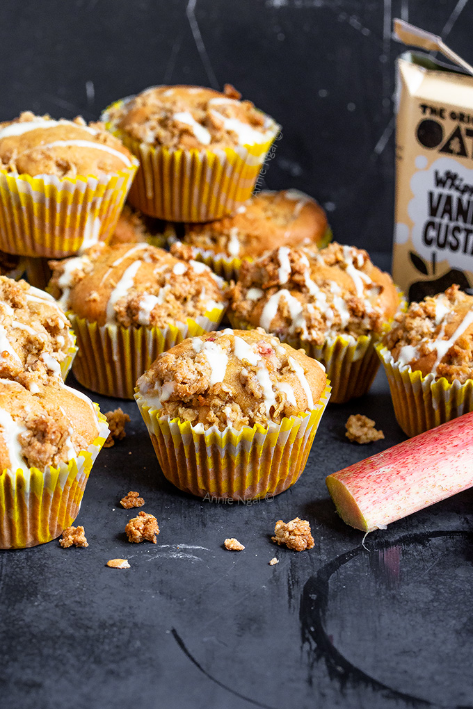 These Rhubarb and Custard Crumble Muffins are packed full of seasonal rhubarb, custard in the batter and finished off with an oaty streusel topping.