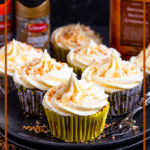 Spiced, carrot filled cupcakes topped with light, fluffy coconut frosting and toasted coconut, these Carrot Cake Coconut Cupcakes are the perfect Spring bake.